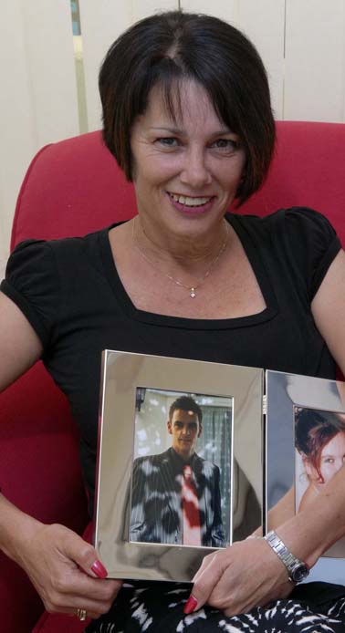 Lorna Daniel with a picture of her son