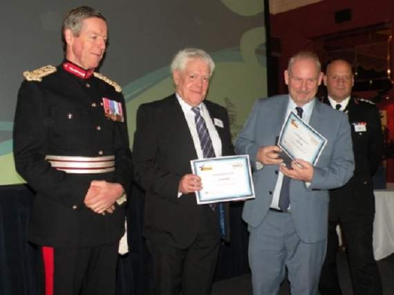 Phil Aldersley receiving his brother’s (Ian’s) award.