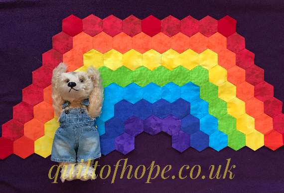 Sales of patterns for Della's rainbow quilt will benefit Cancer Research UK