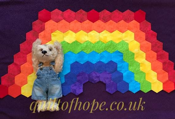 Sales of patterns for Della's rainbow quilt will benefit Cancer Research UK