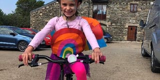 Liliana 'zooms off' on her bike to raise hundreds for Foodbank