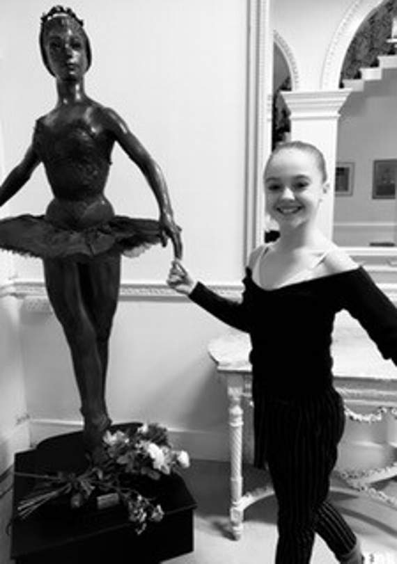 GRACIE holds the ‘lucky’ left forefinger of the Dame Margot Fonteyn statue at White Lodge - but it is talent and sheer hard work that has landed her one of the very few places at the Royal Ballet School