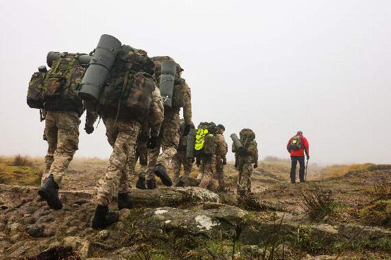 The recruits set off for their navigation exercise across the moors with Les at the front.