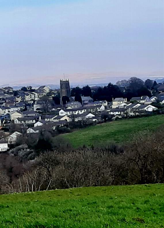 Looking back across over St Stephen's Church in Saltash towards Dartmoor