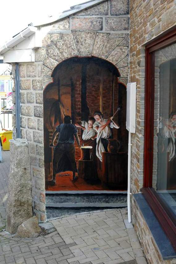 This mural was painted in Callington's Biscombes Lane. Now a competition has been launched to produce three new art works for the town centre