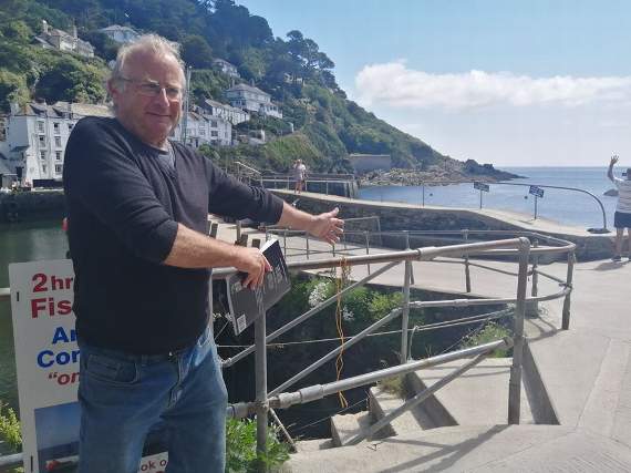 Polperro harbourmaster Ollie Puckey showing where Adopt a Dolphin's first information board is to be placed. There have been lots of sightings around the Cornish and Devon coast in recent days - and its recently been confirmed that Cornwall has its own resident pod of bottlenose dolphins