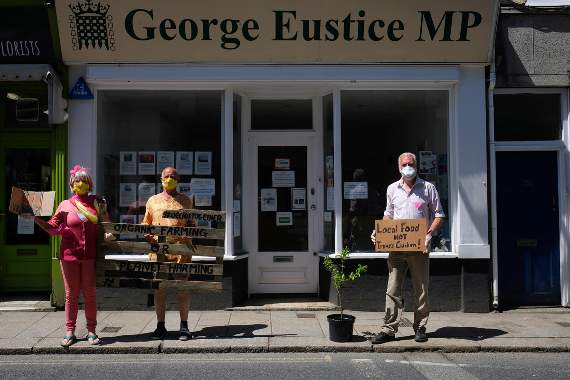 Protestors outside the office of the Secretary of State for the Environment George Eustice