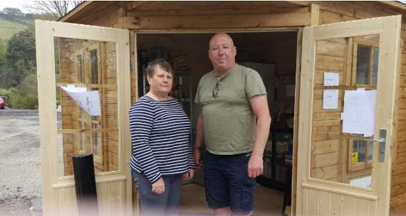 Rob and Gill Berry at the new village shop they've opened in St John, near Torpoint
