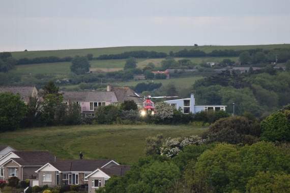 The air ambulance prepares for take off from Looe's Wooldown. Picture by Chris Coolmagic Edwards