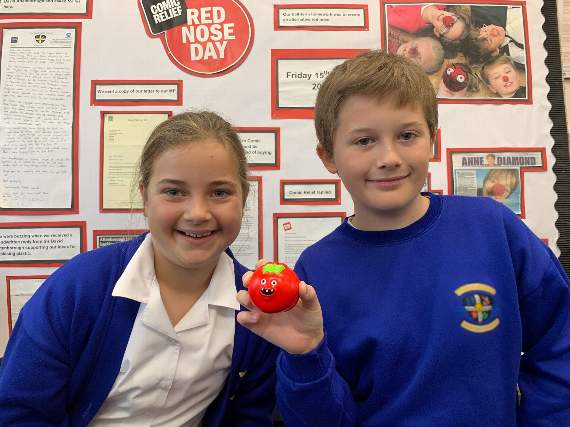 Youngsters at Fourlanesend Primary School checking out the new plant-based Red Nose