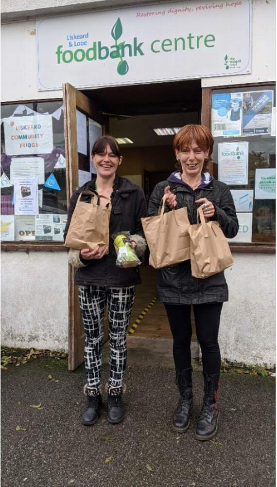Sam and Sue at Community Treasure Chest in Liskeard with some of the packed lunches made by Emma Packham and family ready for distribution