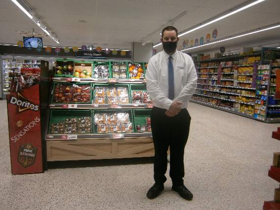 Liskeard Co-op store manager Barry Hill inside the bright new fruit and vegetable section of the store