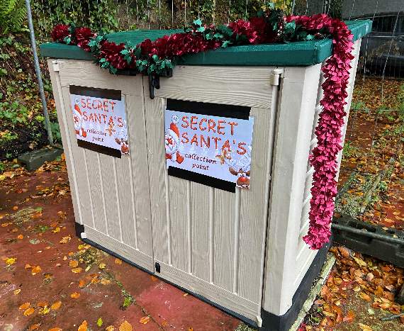 The cupboard outside the Library and Community Hub in the Millpool where people are being encouraged to leave donations