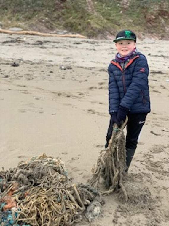 Dylan was one of the pupils who did a beach clean up for charity