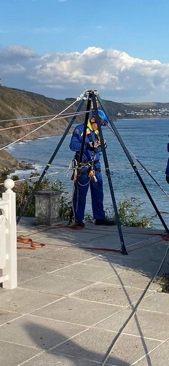 Coastguards accessed the location above the casualties via one of the cliff top properties and carried out a technical rope rescue. Picture Looe Coastguard.
