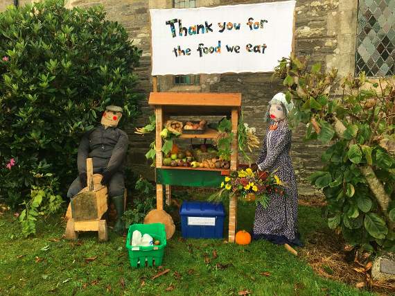 The scarecrow outside St Lalluwy’s Church, at Menheniot.