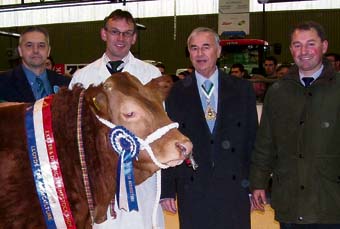 The Supreme Champion On the Phone, a 17-month-old pure-bred limousin steer, with, from left, Judge Mike Alford; The Lord Mayor of Exeter, Cllr John Winterbottom; Mr Philip Catchpole, representing sponsors Lloyds Bank and owner, Mr Simon David. Photos: Wendy Quick.