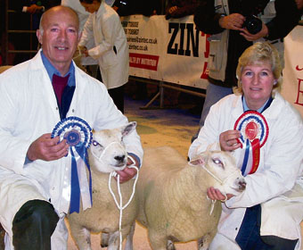 Judith Lapthorne and Robert Darke from Kingsbridge with the Supreme Champion Sheep, a pair of crossbred Texel lambs.