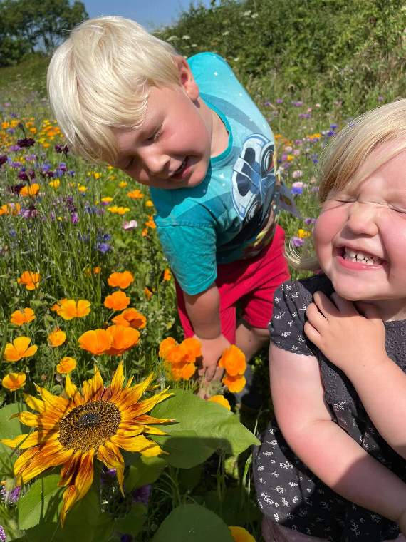 Max and Lowena Martin in the flower field