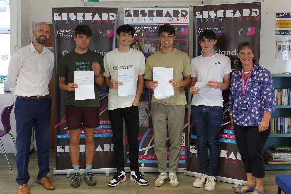 Liskeard A Level twins Ollie and Will Trevarthen, plus Dan Tothill and Sam Berne with headteacher Alex Lingard, left