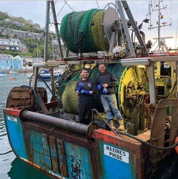 Ivan Toms (right) on board Maxine's Pride