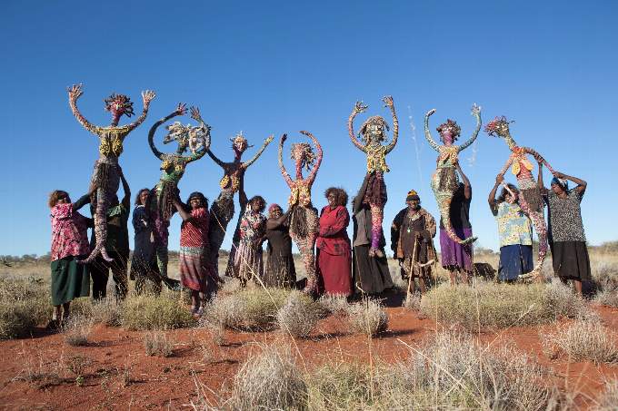 Artists from the Tjanpi Desert Weavers let their tjanpi sisters fly, 2015. Image: Annieka Skinner