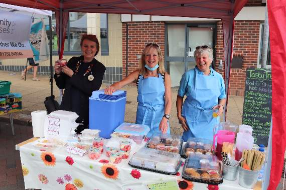 Some of the Saltash Community Enterprises team at their stall in Fore Street