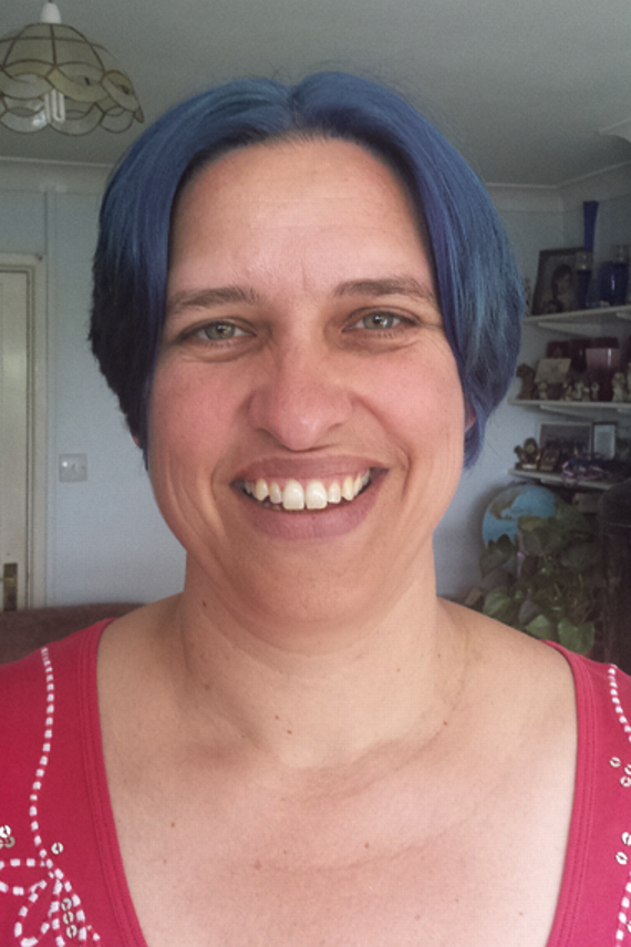 Janet May with her cut and blue dyed hair.
