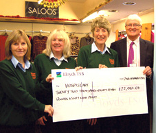Members of staff at Mole Avon Town and Countrywear, Glenys Bedford, Joan Jenner and Daphne Pottle with John Arnold, corporate relations manager for Hospiscare. NP 021213 01