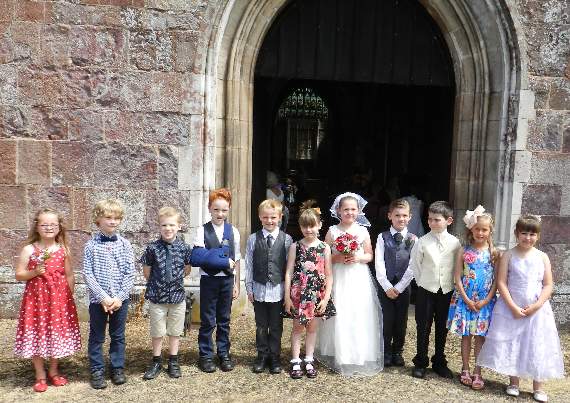 Some of the children from Team One at Landscore Primary School who took part in a mock wedding at Crediton Parish Church. NP 100715 10