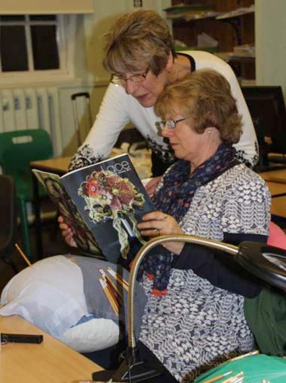 Daphne Pottle (left) with one of her students at a Honiton Lace class.