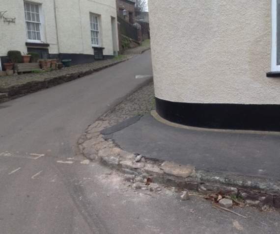 The crumbling footpath near Homeside, Sandford, which Sandford Parish Council is asking is repaired.