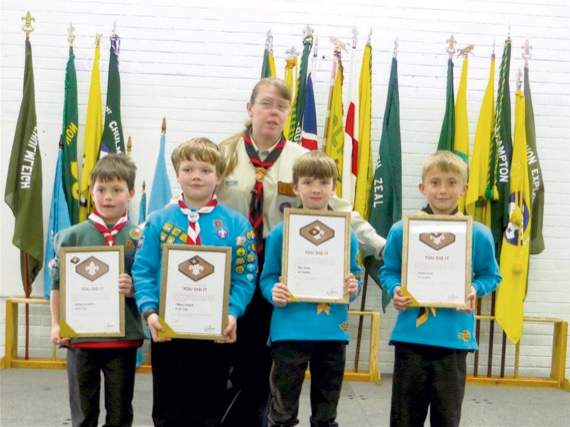 Helen Derbyshire with four of the Beavers with their bronze awards. SR 0873