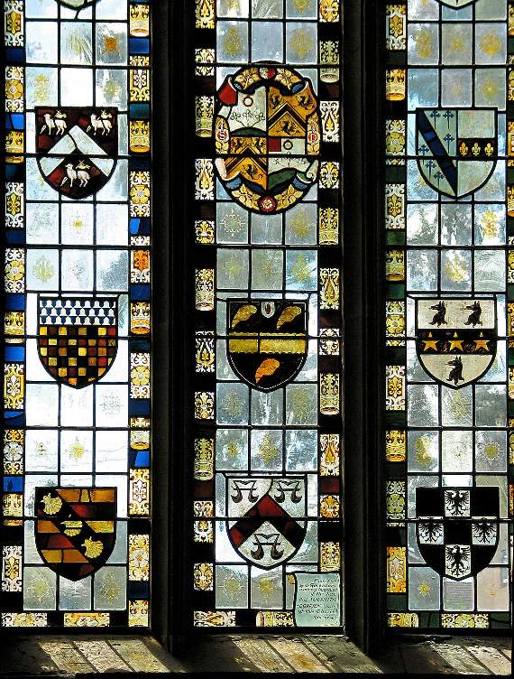 The armorial window depicting the coats of arms of a number of well-know local families in Crediton Parish Church.