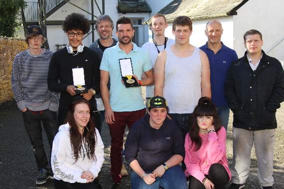 Invictus Games Toronto 2017 double cycling gold medal winner Karl Allen-Dobson, standing fourth left, with Amber tutor Ian Chattington, standing third left, with some of the residents who attended his inspiring talk. AQ 5038