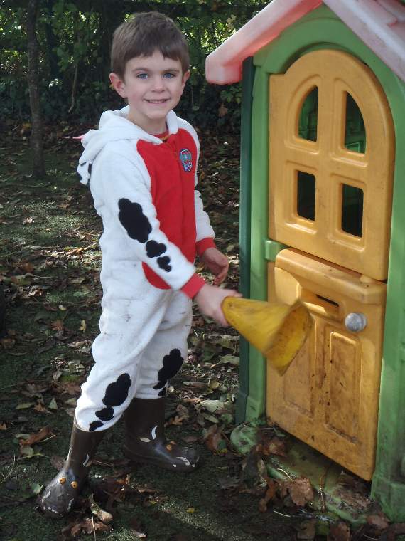 A Chulmleigh Primary School child in his pyjamas and wellies.