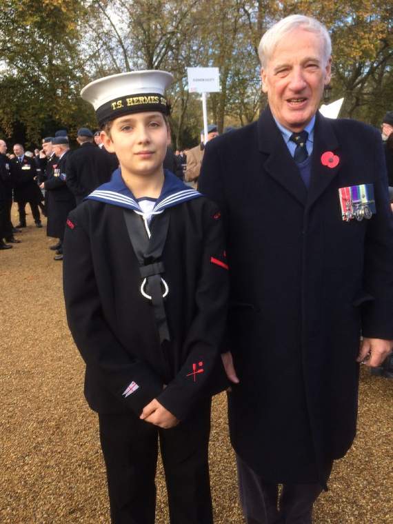 QE student Douglas Coningsby-Pogson and his grandfather Michael Norris, who took part in the Remembrance Parade in front of the Cenotaph in London last weekend.