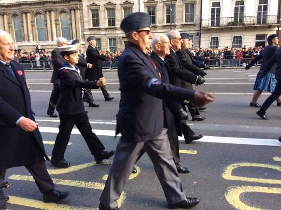 QE student Douglas Coningsby-Pogson (13), marching in the Remembrance Parade in front of the Cenotaph in London last weekend with his grandfather Michael Norris, left.