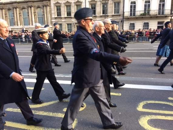 QE student Douglas Coningsby-Pogson (13), marching in the Remembrance Parade in front of the Cenotaph in London last weekend with his grandfather Michael Norris, left.