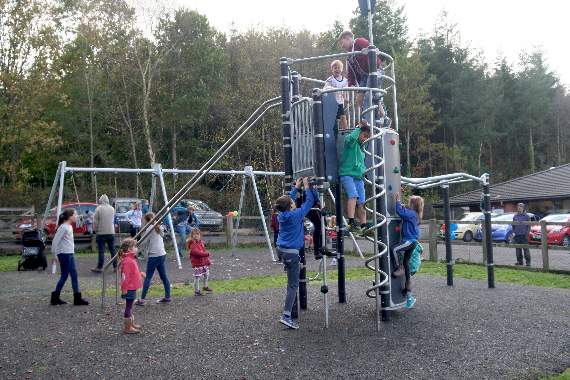 Young people testing a piece of the new equipment at Yeoford. SR 8486