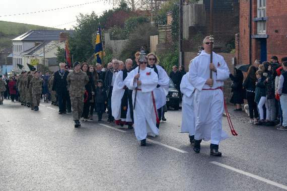 Leading the procession from the parish church to the War Memorial on Sunday morning. SR 8520