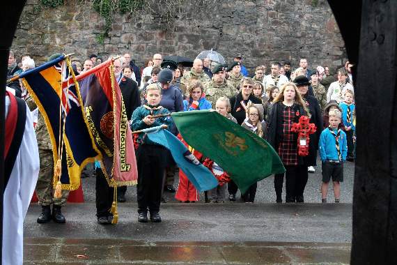 Holding banners and standards at half mast during the silence at the War Memorial on Sunday morning. SR 8530