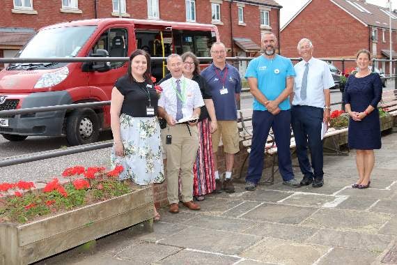 Linda Brown, third left, during happier times, when Britain in Bloom judges admired the flowers she cares for outside the Station Tea Rooms and Craft Shop at Crediton Railway Station. AQ 1094