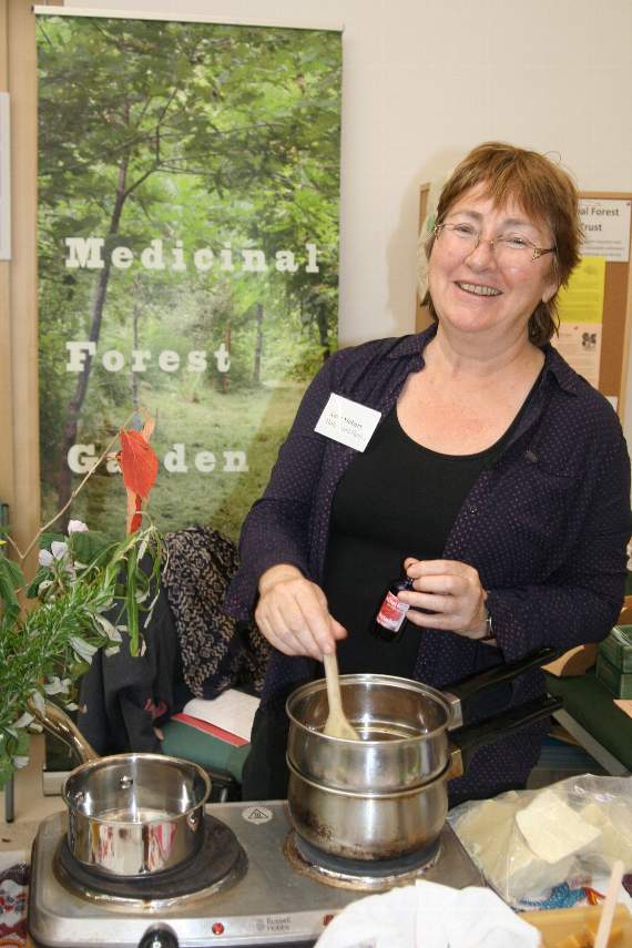 Anne Stobart stirring the balm she was making. SR 8408