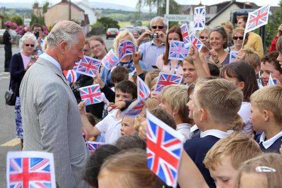 Children from Cheriton Bishop Primary School welcomed HRH The Prince of Wales to the village where he officially opened the Devon YFC Rural Hub. AQ 1134