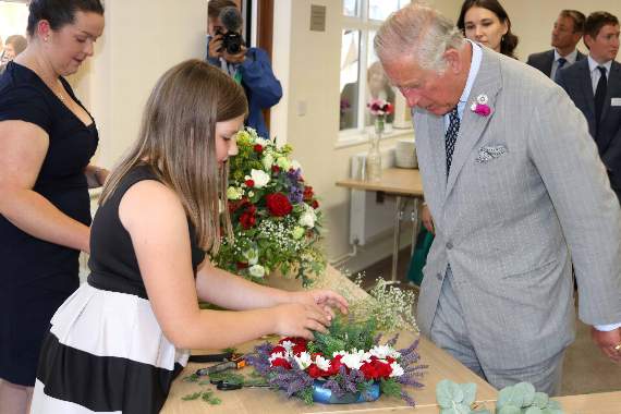 Gracie Rice (10), from Cruwys Morchard YFC demonstrated flower arranging for HRH The Prince of Wales to view during his visit to the YFC offices. AQ 1223