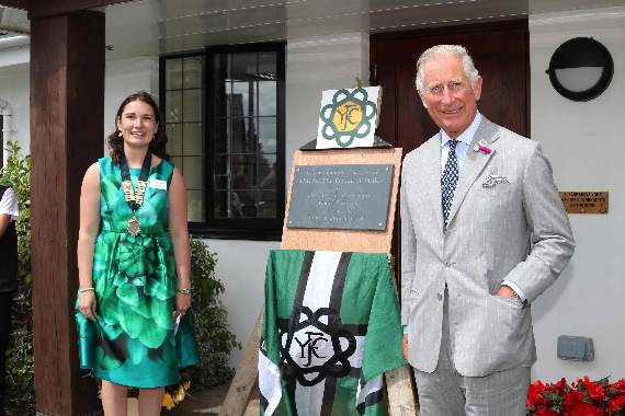 HRH The Prince of Wales unveiled a plaque to mark the official opening of the Devon YFC Rural Hub at Cheriton Bishop, pictured with Devon YFC chairman, Claire Bellew, left. AQ 1374