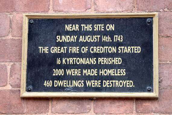 The sign commemorating the Great Fire of Crediton in Crediton High Street. AQ 2401