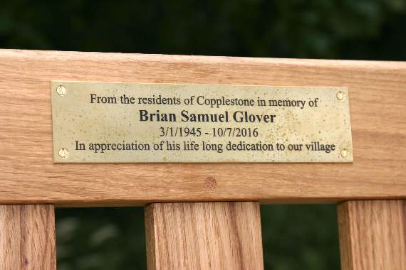 The plaque on the bench in memory of Brian Glover. AQ 4792
