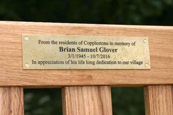 The plaque on the bench in memory of Brian Glover. AQ 4792